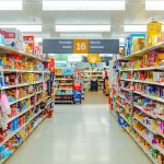 a grocery store aisle filled with lots of food