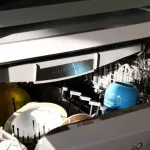 blue and white cooking pot on stove